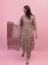 Beige Suit With Mauve And Mehendi Green Floral Suit